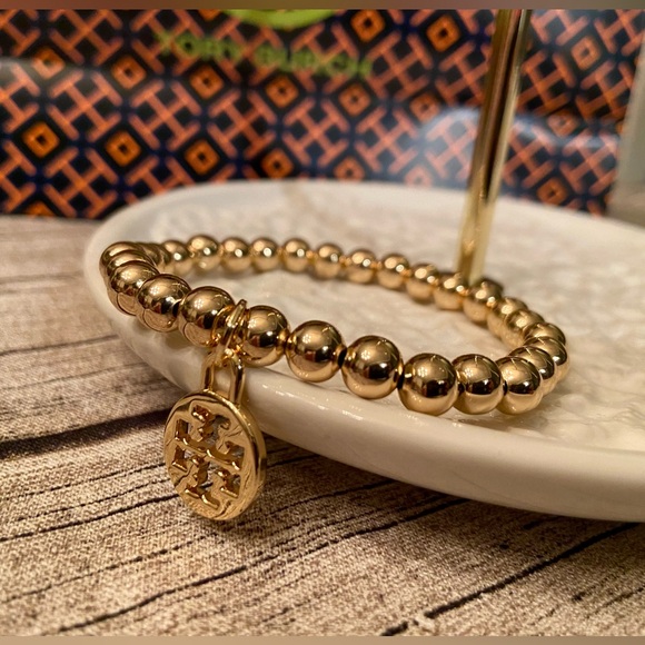 New! Gorgeous beaded, stretchy bracelet with Tory Burch logo charm - Picture 3 of 12